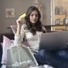 Youn lady couch laptop c card eCommerce Starter